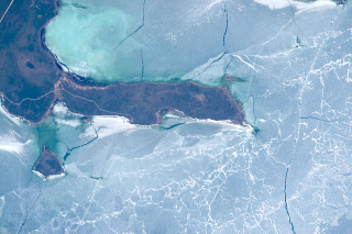 Illustration for article titled Who Cracked The Planet? Ice Shatters In Spring Melt